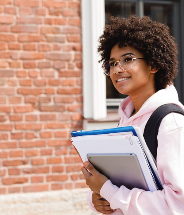 University student holding files